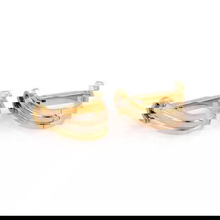 CARTIER 18K TRI-COLOR GOLD OVAL SHAPE FLEX CUFFLINKS: CARTIER 18K TRI-COLOR GOLD OVAL SHAPE FLEX CUFFLINKS Cartier 18k Tri-Color Gold Oval Shape Flex Cufflinks Description These authentic Cartier cufflinks are finely crafted from 18k yellow, white, and r