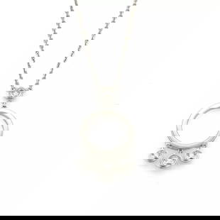 CARTIER DIAMOND 18K WHITE GOLD DROP CHARMS CIRCLE PENDANT NECKLACE: CARTIER DIAMOND 18K WHITE GOLD DROP CHARMS CIRCLE PENDANT NECKLACE Cartier Diamond 18k White Gold Drop Charms Circle Pendant Necklace Description This gorgeous pendant anc chain necklace is by Cartier