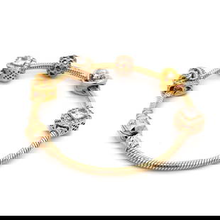 PANDORA  14K GOLD 5 SLIDE CHARMS SNAKE CHAIN BRACELET: PANDORA 14K GOLD 5 SLIDE CHARMS SNAKE CHAIN BRACELET This authentic and charming bracelet is by Pandora, crafted from 14k yellow gold featuring a 3mm thick snake cable bracelet with 5 assorted style c
