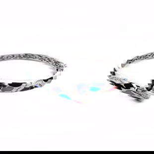 DIAMOND TANZANITE GOLD BRACELET 14K WHITE INLAY HINGE BANGLE: DIAMOND TANZANITE GOLD BRACELET 14K WHITE INLAY HINGE BANGLE This is a contemporary bracelet, it is crafted from 18k white gold, it is hinged on one side with push lock on the other side. The front