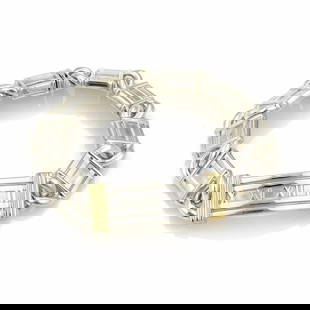 TIFFANY & CO. ATLAS BAR BRACELET NUMERAL STERLING 18K GOLD OPEN LINKS: TIFFANY & CO. ATLAS BAR BRACELET NUMERAL STERLING 18K GOLD OPEN LINKS Tiffany & Co. ATLAS Numeral Sterling 18k Gold Curved Long Bar Bracelet Description This hefty bold authentic bracelet is by Tiffan
