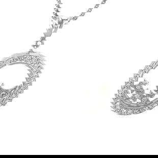 DIAMOND GOLD NECKLACE 14K WHITE FLOATING MOON & STARS BEZEL: DIAMOND GOLD NECKLACE 14K WHITE FLOATING MOON & STARS BEZEL This is a beautiful 14k white gold pendant and chain necklace; the pendant shape is round with double glass cover with diamond bezel, 1 floa