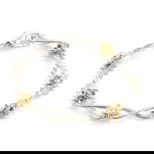TIFFANY & CO.  INFINITY LINK BRACELET PICASSO STERLING SILVER 18K YELLOW GOLD: TIFFANY & CO. INFINITY LINK BRACELET PICASSO STERLING SILVER 18K YELLOW GOLD Tiffany & Co. Picasso 925 Silver 18k Yellow Gold Infinity Link Bracelet Description This is an authentic bracelet from Tiff