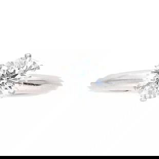 TIFFANY & CO.. 1.00 CARAT F-VS1 DIAMOND 18K WHITE PLATINUM ENGAGEMENT RING: TIFFANY & CO.. 1.00 CARAT F-VS1 DIAMOND 18K WHITE PLATINUM ENGAGEMENT RING Title: Tiffany and Co 1.00 Carat Round Brilliant Shape F-VS1 Diamond 18 Karat White Platinum Engagement Ring Style: Engagemen