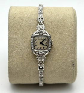 VINTAGE WOMAN'S HAMILTON WATCH 14K WHITE GOLD WITH 1.50CTS OF DIAMONDS: Vintage Woman's Hamilton Watch 14k White Gold with 1.50cts of Diamonds Condition: Used. Material: Solid 14kt white gold case and band. Weighs 11.4 grams without the movement inside and 14.5 grams with