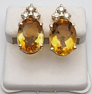 14K GOLD EARRINGS SET WITH CITRINE AND 0.42CTS OF DIAMONDS   8.1G: 14K GOLD EARRINGS SET WITH CITRINE AND 0.42CTS OF DIAMONDS 8.1G 14k Gold Earrings set with Citrine and 0.42cts of Diamonds Condition: Display pair, light marks have been cleaned Material: 14k Yellow G