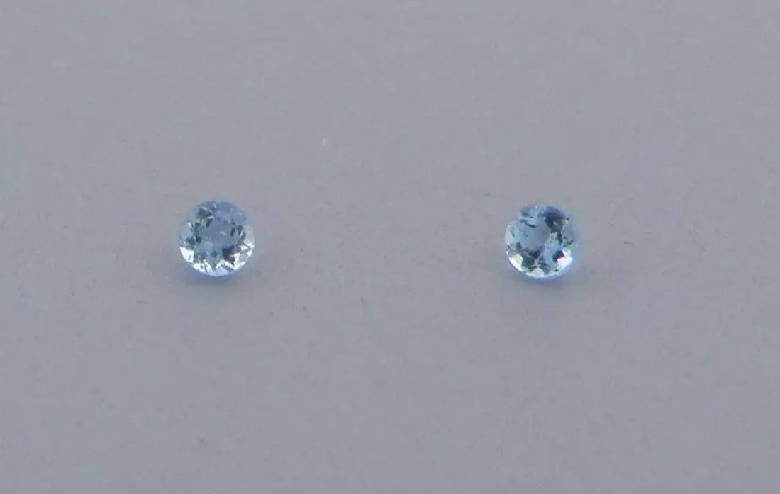 LOOSE NATURAL AQUAMARINE ROUND CUT Sale is for 2 round cut natural Aquamarine Matching pair: LOOSE NATURAL AQUAMARINE ROUND CUT Sale is for 2 round cut natural Aquamarine Matching pair Beautiful blue color (this stone is harder to find due to the darker blue color) Aquamarines measures 1.5mm 