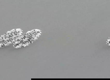 LOOSE NATURAL UNTREATED DIAMONDS Sale is for 2 round cut natural untreated earth mined diamond Sale: LOOSE NATURAL UNTREATED DIAMONDS Sale is for 2 round cut natural untreated earth mined diamond Sale is for a matching pair Diamonds measures 2.5mm in diameter Diamonds are full cut Diamonds are G colo