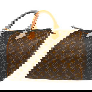 LOUIS VUITTON MONOGRAM SPEEDY 35 HANDBAG: LOUIS VUITTON MONOGRAM SPEEDY 35 HANDBAG Louis Vuitton Monogram Speedy 35 Handbag M41524 Description OUTSIDE : A+: VERY GOOD CONDITION!! Discoloration and some stains on the leather parts. INSIDE : A+