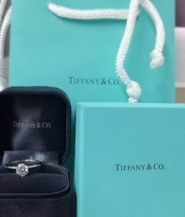 VINTAGE TIFFANY & CO PLATINUM ENGAGEMENT RING 0.85CT. NATURAL DIAMOND SIZE 7: VINTAGE TIFFANY & CO PLATINUM ENGAGEMENT RING 0.85CT. NATURAL DIAMOND SIZE 7 Presenting a stunning Tiffany & Co. engagement ring crafted in platinum. The ring features a natural old euro round diamond