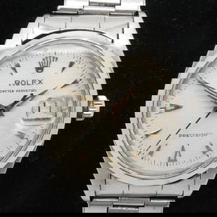 ROLEX OYSTER PERPETUAL DATE 6494 STAINLESS STEEL MANUAL WATCH - 34MM: ROLEX OYSTER PERPETUAL DATE 6494 STAINLESS STEEL MANUAL WATCH - 34MM Rolex Oyster Perpetual Date Reference 6494 Serial # 457** Stainless Steel Honeycomb Dial Manual Watch Case Size - 34mm Fits up to 7