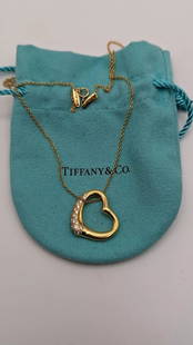 TIFFANY & CO 18K GOLD ELSA PERETTI .38CT DIAMOND OPEN HEART PENDANT NECKLACE 16": Tiffany & Co. 18K Yellow Gold Elsa Peretti Open Heart Diamond Pendant Necklace Length - 16" Pendant Size - 21mm Total Weight - 8.0 Gram Excellent Condition & Very Well Kept Pouch NOT Included