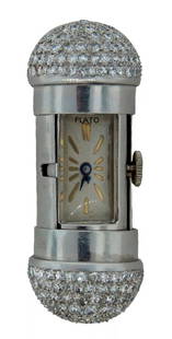 DIAMOND PLATINUM TRAVEL CLOCK WATCH PENDANT BY PAUL FLATO RARE ART DECO 1930S: DIAMOND PLATINUM TRAVEL CLOCK WATCH PENDANT BY PAUL FLATO RARE ART DECO 1930S Art Deco Diamond Platinum Travel Clock by Paul Flato This unique travel clock was created by Paul Flato in New York in the