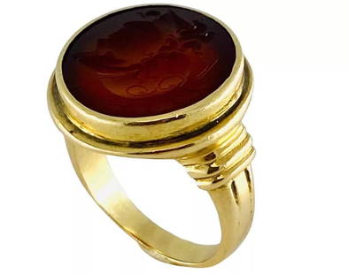 ANTIQUE CARNELIAN INTAGLIO 14K GOLD SIGNET RING: ANTIQUE CARNELIAN INTAGLIO 14K GOLD SIGNET RING DESIGNER: Unknown CIRCA: 1890s MATERIALS: 14k Yellow Gold GEMSTONE: Carnelian WEIGHT: 17.6 grams RING SIZE: 10.5 - 10.75 MEASUREMENTS: Diameter - 3/4" H