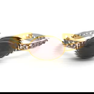 VINTAGE 26.20 GRAMS 18 KARAT YELLOW GOLD BROWN MOONSTONE CUFF BRACELET: VINTAGE 26.20 GRAMS 18 KARAT YELLOW GOLD BROWN MOONSTONE CUFF BRACELET PRODUCT DESCRIPTION Title: 18 Karat Yellow Gold Cuff Bracelet Style: Cuff Metal: 18 Karat Yellow Gold Dimension: 6"wide-0.70in We