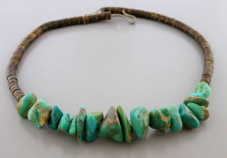 VINTAGE NAVAJO STERLING SILVER HEISHI NUGGET ROYSTON TURQUOISE NECKLACE: VINTAGE TURQUOISE STERLING SILVER NECKLACE Vintage sterling silver Nugget Royston Turquoise necklace with Heishi beads Measures 16" LongMeasures apx 0.73" at it's widest Vintage, Pre-owned, in good co