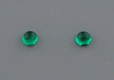 3mm ROUND MATCHING PAIR CABOCHON COLOMBIAN EMERALD: Sale is for 2 round cabochon natural Colombian EmeraldsMatching pairEmeralds measures 3mm in diameterNaturalNew, never used before