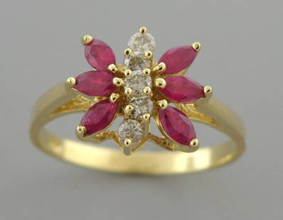 14K YELLOW GOLD DIAMOND & RUBY BUTTERFLY RING: LADIES 14K YELLOW GOLD RUBY & DIAMOND BUTTERFLY RING SIZE 7.5Ring size is a 7.5 (can easily be resized by your local jeweler)14K yellow gold, diamond and ruby butterfly ringTotal ct weight apx 0.50ctP