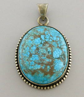 VINTAGE BEAUTIFUL NAVAJO STERLING SILVER LARGE SPIDERWEB TURQUOISE PENDANT: TURQUOISE STERLING SILVER PENDANT Turquoise sterling silver pendant Vintage Navajo Sterling silver Spiderweb turquoise pendant Measures 2.07" H x 1.22" W Turquoise measures 1.33" x 1.03" Vintage, Pre-