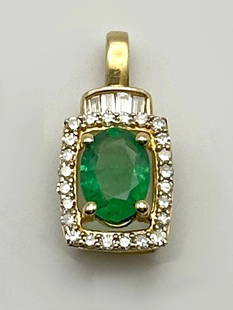 10K GOLD PENDANT WITH LAB CREATED EMERALD AND 0.33CTS OF NATURAL DIAMONDS: 10K GOLD PENDANT WITH LAB CREATED EMERALD AND 0.33CTS OF NATURAL DIAMONDS 10k Gold Pendant with Lab Made Emerald and 0.33cts of Natural Diamonds Condition: Used, has been cleaned Material: 10k Yellow