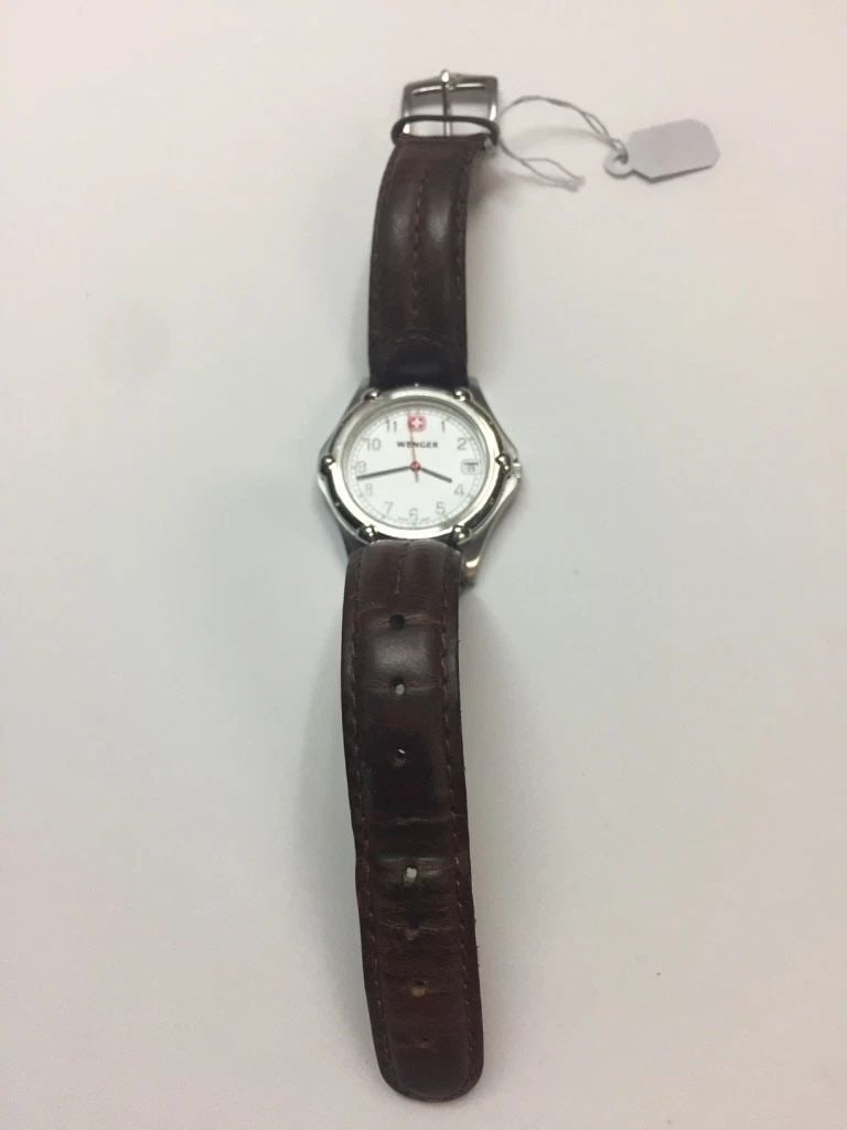 WENGER STAINLESS STEEL WATCH 7010X: WENGER STAINLESS STEEL WATCH 7010X Wenger Stainless Steel Watch 7010X You are bidding on a pre-owned Wenger Stainless Steel Watch 7010X. The watch is in excellent working condition. There are some scu