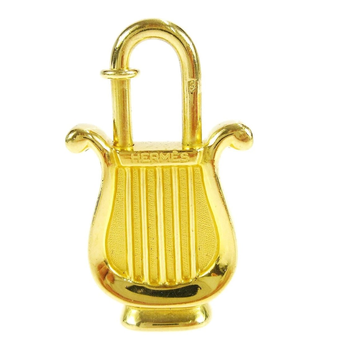 HERMES HARP MOTIF 1996 LIMITED CADENA PADLOCK GOLD BAG: HERMES HARP MOTIF 1996 LIMITED CADENA PADLOCK GOLD BAG HERMES HARP MOTIF 1996 LIMITED CADENA PADLOCK GOLD BAG Exterior : A+: VERY GOOD CONDITION!! Minor scratched Number :- Size (Inch) :Length : 35.8