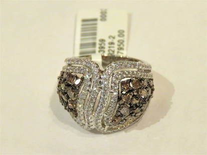 18KT FANCY DIAMOND CHAMPAGNE DIAMOND RING: 18KT FANCY DIAMOND CHAMPAGNE DIAMOND RING LAST CALL, LAST CHANCE!! LIQUIDATION SALE!! The Following Items we are offering is this Rare Important Radiant 18KT Gold Fancy White and Champagne Diamond Rin
