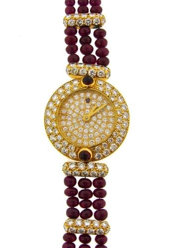 VINTAGE BOUCHERON 18K YELLOW GOLD LADY'S WATCH DIAMOND RUBY QUARTZ: VINTAGE BOUCHERON 18K YELLOW GOLD LADY'S WATCH DIAMOND RUBY QUARTZ BOUCHERON 18 karat Yellow Gold Diamond Ruby Lady's Watch Bracelet Elegant lady's watch made of 18 karat (stamped) yellow gold. The wa