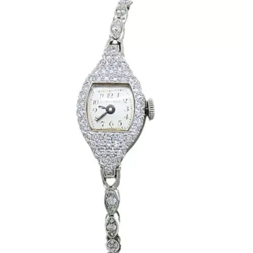 LONGINES WATCH ART DECO PLATINUM LADIES WATCH: LONGINES WATCH ART DECO PLATINUM LADIES WATCH Product details: DESIGNER: Longines CIRCA: 1920’s MATERIALS: Platinum GEMSTONE: Diamonds WEIGHT: 16.1 Grams MEASUREMENTS: 6" x 1/2" HALLMARKS: 10% irid