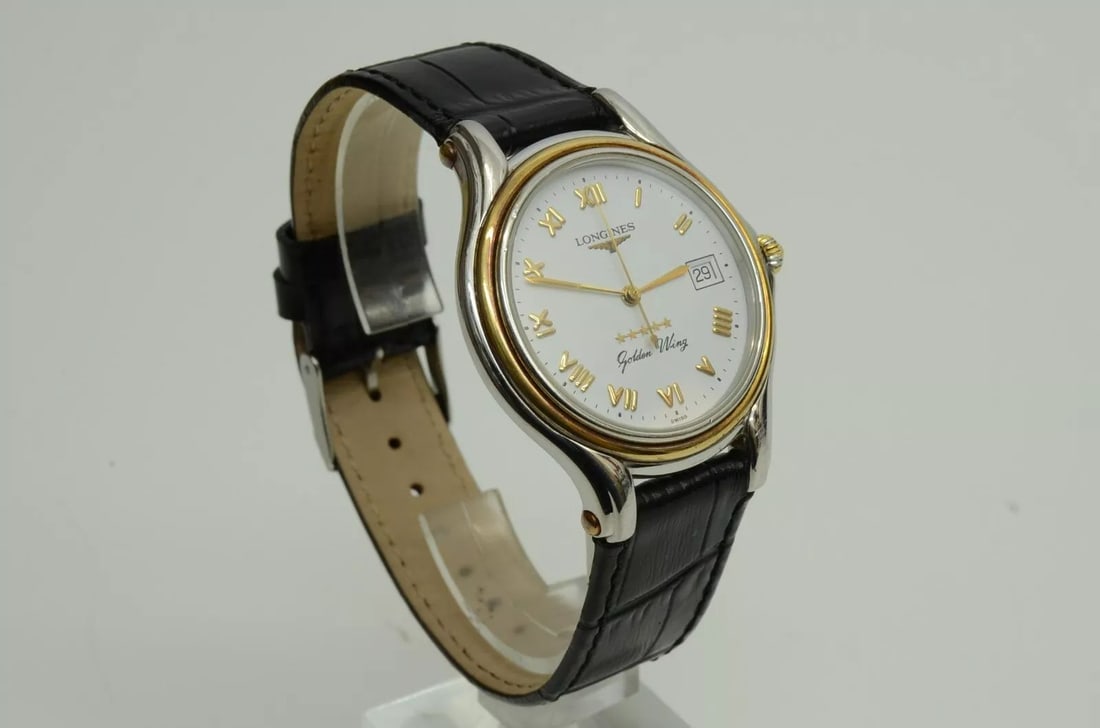 AUTHENTIC LONGINES GOLDEN WING WATCH 33MM QUARTZ SS GP LEATHER ROMAN NUMERAL VTG: Authentic Longines Golden Wing Watch 33mm Quartz SS GP Leather Roman Numeral VTG AUTHENTIC LONGINES GOLDEN WING WATCH 33MM QUARTZ SS GP LEATHER ROMAN NUMERAL VTG Longines Golden Wing Overhauled 33mm C