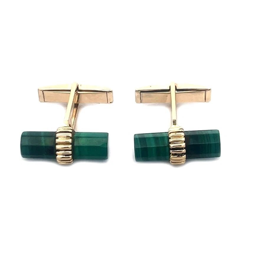 CARTIER GOLD MALACHITE CUFFLINKS 14K YELLOW VINTAGE WHALE BACK: The is a handsome vintage pair of cufflinks by Cartier, it features a natural green malachite stone depicting short columns held in 14k yellow gold clamps with whale backs. The cufflinks are vintage a