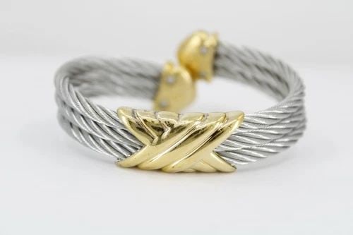 CHARRIOL GOLD VERMEIL STAINLESS STEEL TRIPLE CABLE WIRE X CUFF BRACELET 6.5": CHARRIOL GOLD VERMEIL STAINLESS STEEL TRIPLE CABLE WIRE X CUFF BRACELET 6.5" CHARRIOL GOLD VERMEIL STAINLESS STEEL TRIPLE CABLE WIRE X CUFF BRACELET 6.5" Description Charriol Yellow Gold Vermeil Stain