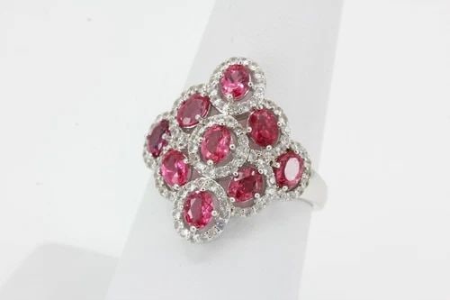JS 925 STERLING CHINA PINK SPINEL W/ CUBIC ZIRCONIA MULTI HALO RING SIZE 7: JS 925 STERLING CHINA PINK SPINEL W/ CUBIC ZIRCONIA MULTI HALO RING SIZE 7 Description JS 925 Sterling China Pink Spinel w/ Cubic Zirconia Multi Halo Ring Kite Design Shape Item is in great condition.