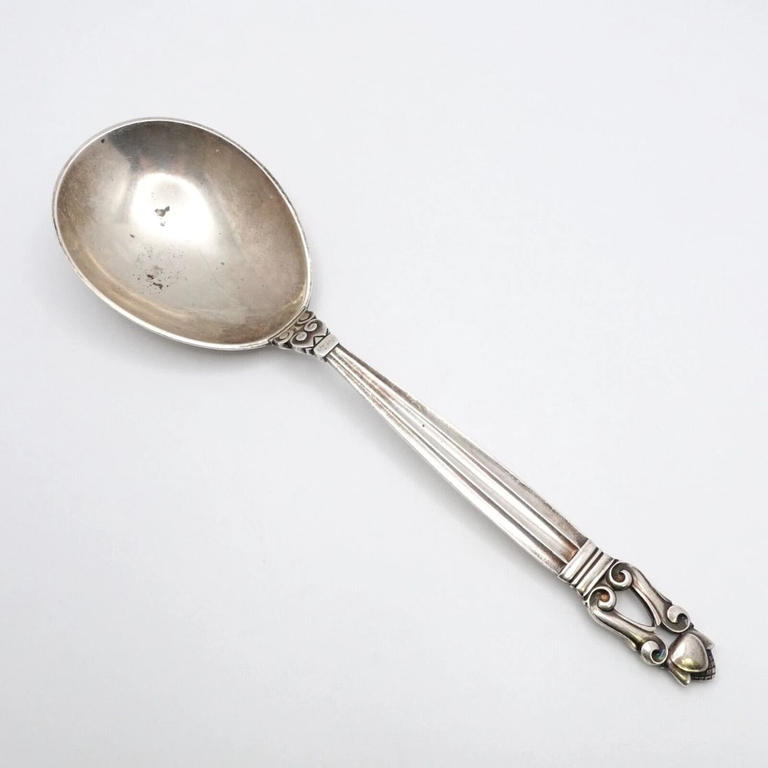 GEORG JENSEN JOHAN ROHDE STERLING SILVER ACORN SMALL SERVING SPOON 7.8": GEORG JENSEN JOHAN ROHDE STERLING SILVER ACORN SMALL SERVING SPOON 7.8" Vintage Georg Jensen Design by Johan Rohde Sterling Silver Acorn Pattern Small Serving Spoon Length - 7.8" Est. Retail - $425 US