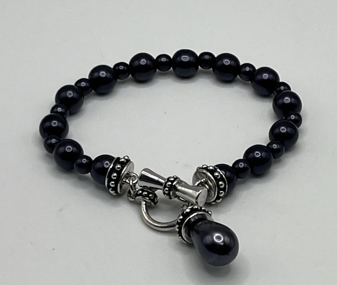 BLACK/PURPLE PEARL BRACELET 7" PLUS TOGGLE (1 of 2)