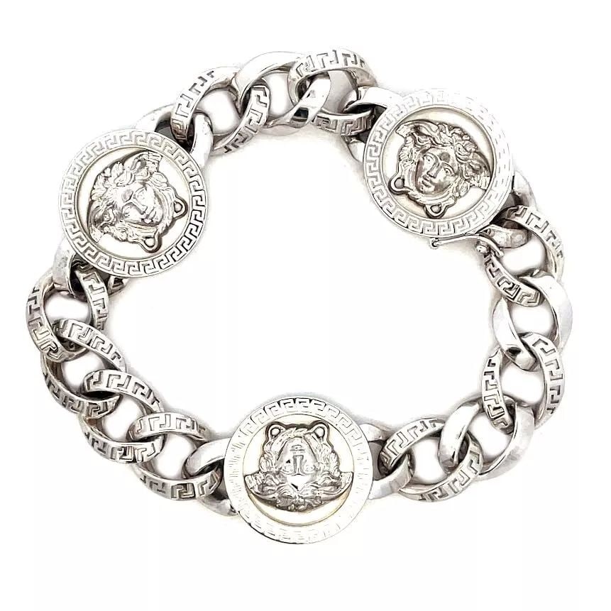 GIANNI VERSACE GOLD BRACELET 18K WHITE MEDUSA MEDALLION 9" LONG: GIANNI VERSACE GOLD BRACELET 18K WHITE MEDUSA MEDALLION 9" LONG This impressive authentic bracelet is by designer Gianni Versace from his famous trademark Medusa Collection. Crafted from 18k white gol