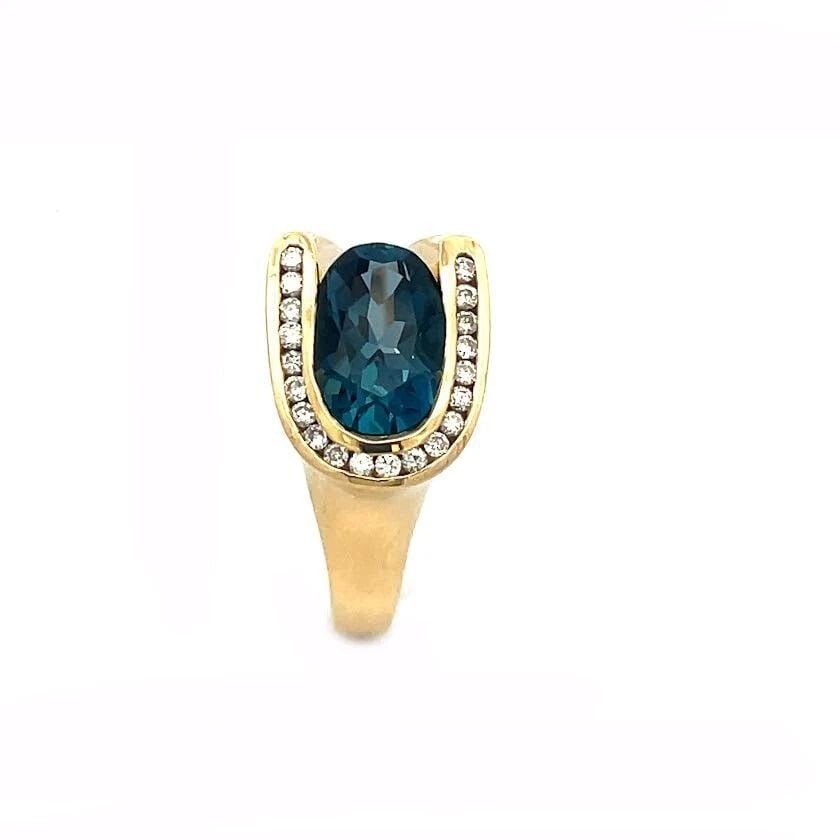 CHARLES KRYPELL HORSESHOE RING DIAMOND BLUE TOPAZ 18K YELLOW GOLD: CHARLES KRYPELL HORSESHOE RING DIAMOND BLUE TOPAZ 18K YELLOW GOLD This is a beautiful authentic ring from Charles Krypell, it is crafted from 18k yellow gold with a fine polished finish featuring a ho