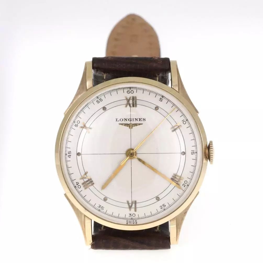 LONGINES MEN'S 14K YELLOW GOLD HAND WIND LEATHER BAND WATCH: LONGINES MEN'S 14K YELLOW GOLD HAND WIND LEATHER BAND WATCH 2117 Longines Men's 14k Yellow Gold Hand Wind Leather Band Watch LIQUIDATION! Description This is an authentic men's wrist watch by Longines