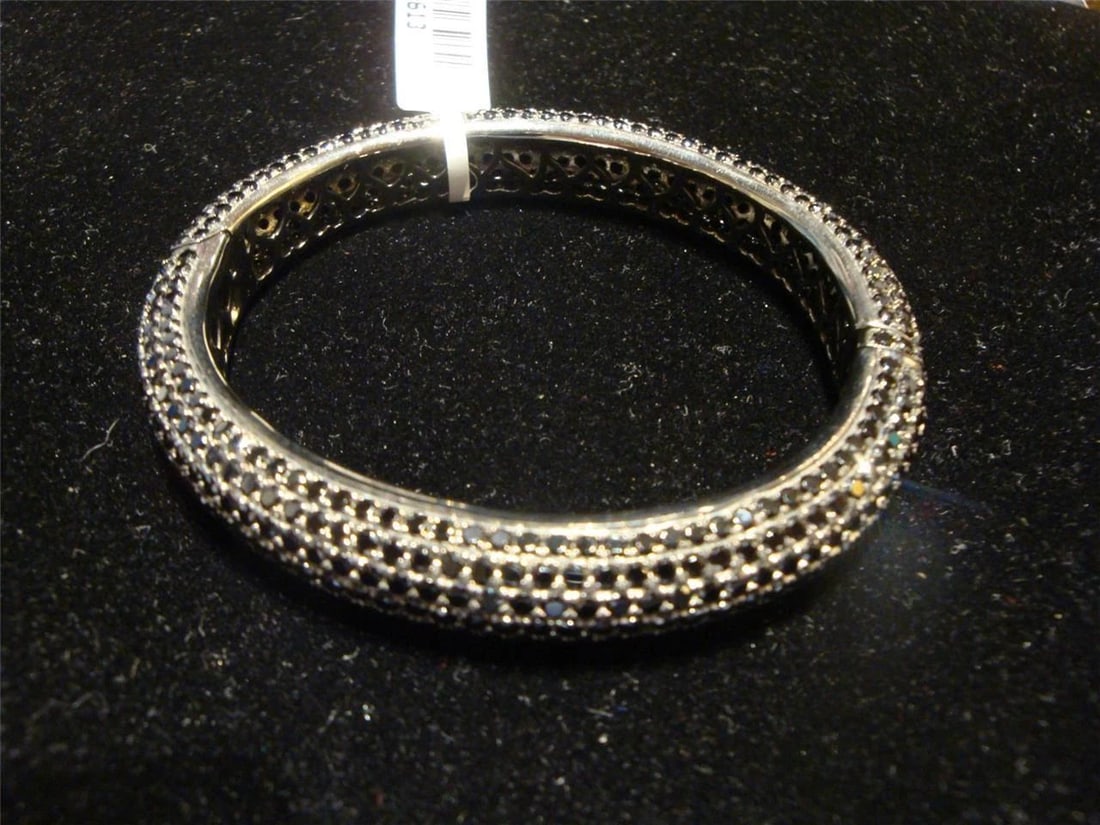 BLACK SPINEL CLUSTER CUFF BANGLE BRACELET 23 CTS: BLACK SPINEL CLUSTER CUFF BANGLE BRACELET 23 CTS RARE BLACK SPINEL CLUSTER CUFF BANGLE BRACELET 23 CTS RET:$4000 The Following Item we are offering is this Rare FANCY BLACK SPINEL CUFF BANGLE WITH 23