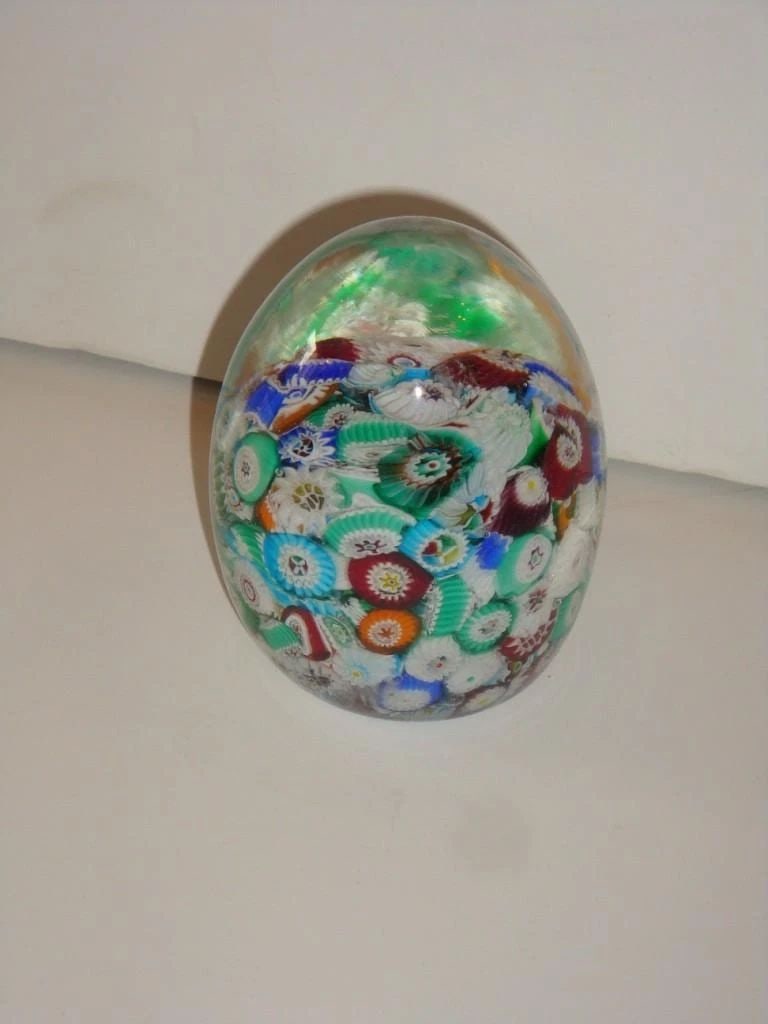 HEAVY ITALIAN MILLEFIORI COLORED GLASS PAPERWEIGHT: HEAVY ITALIAN MILLEFIORI COLORED GLASS PAPERWEIGHT RARE HEAVY ITALIAN MILLEFIORI COLORED GLASS PAPERWEIGHT Search The Following Item that we are Offering is A Beautiful and Rare Exquisite Heavy Italia