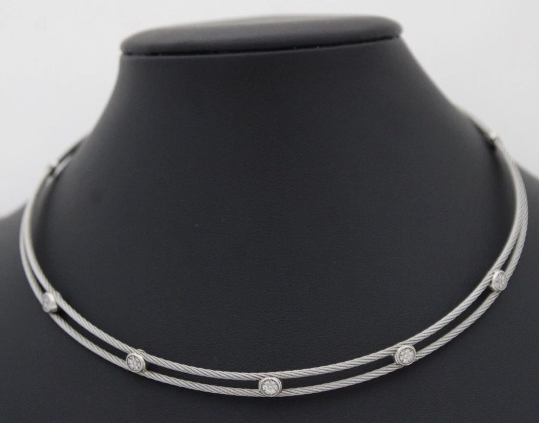 CHARRIOL 18K & STAINLESS STEEL DOUBLE CABLE DIAMOND STATION CHOKER NECKLACE: CHARRIOL 18K & STAINLESS STEEL DOUBLE CABLE DIAMOND STATION CHOKER NECKLACE Description Philippe Charriol 18K White Gold & Stainless Steel Double Cable Round Pave Set Diamond Station Necklace Necklace