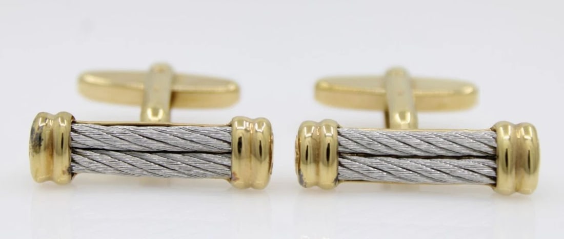 PHILIPPE CHARRIOL CABLE STAINLESS STEEL & 18K YELLOW GOLD VERMEIL CUFFLINKS: PHILIPPE CHARRIOL CABLE STAINLESS STEEL & 18K YELLOW GOLD VERMEIL CUFFLINKS Description Philippe Charriol Cable Stainless Steel & 18k Yellow Gold Vermeil Cufflinks Cuff links are in good condition. Sh