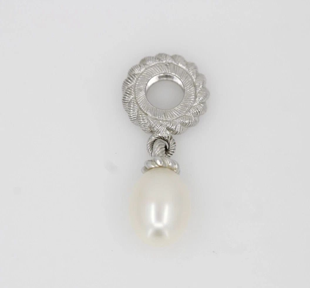 JUDITH RIPKA STERLING SILVER CULTURED FRESHWATER PEARL DANGLE CHARM PENDANT: JUDITH RIPKA STERLING SILVER CULTURED FRESHWATER PEARL DANGLE CHARM PENDANT Description Judith Ripka Sterling Silver Cultured Freshwater Pearl Dangle Charm Pendant Item is in great condition. May show