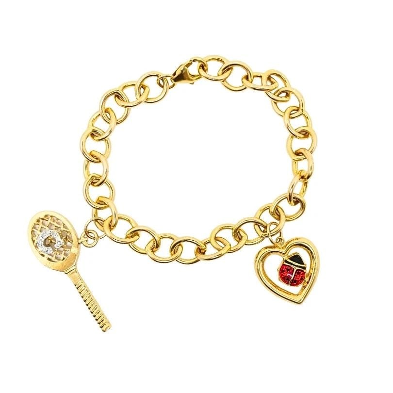14K GOLD LINK CHARM BRACELET VINTAGE JEWELRY: 14K GOLD LINK CHARM BRACELET VINTAGE JEWELRY DESIGNER: Unknown CIRCA: Late 20th Century MATERIALS: 14k Gold, Enamel WEIGHT: 17.7 Grams MEASUREMENTS: 1/4” x 6 7/8" HALLMARKS: 14K, 585 ITEM DETAIL