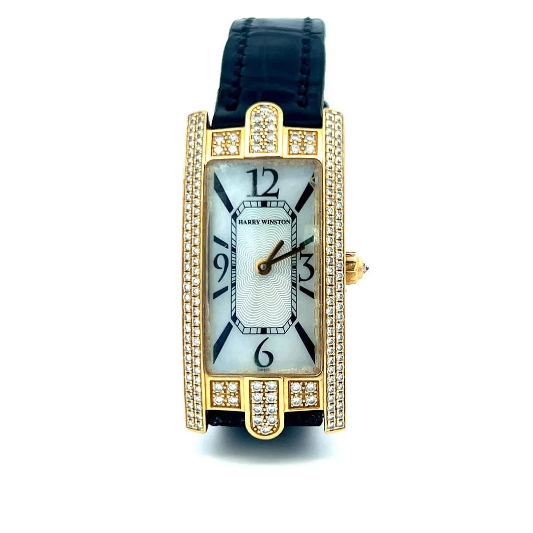 HARRY WINSTON 0.90 CARAT ROUND DIAMOND 18 KARAT YELLOW GOLD WRIST WATCH (1 of 2)