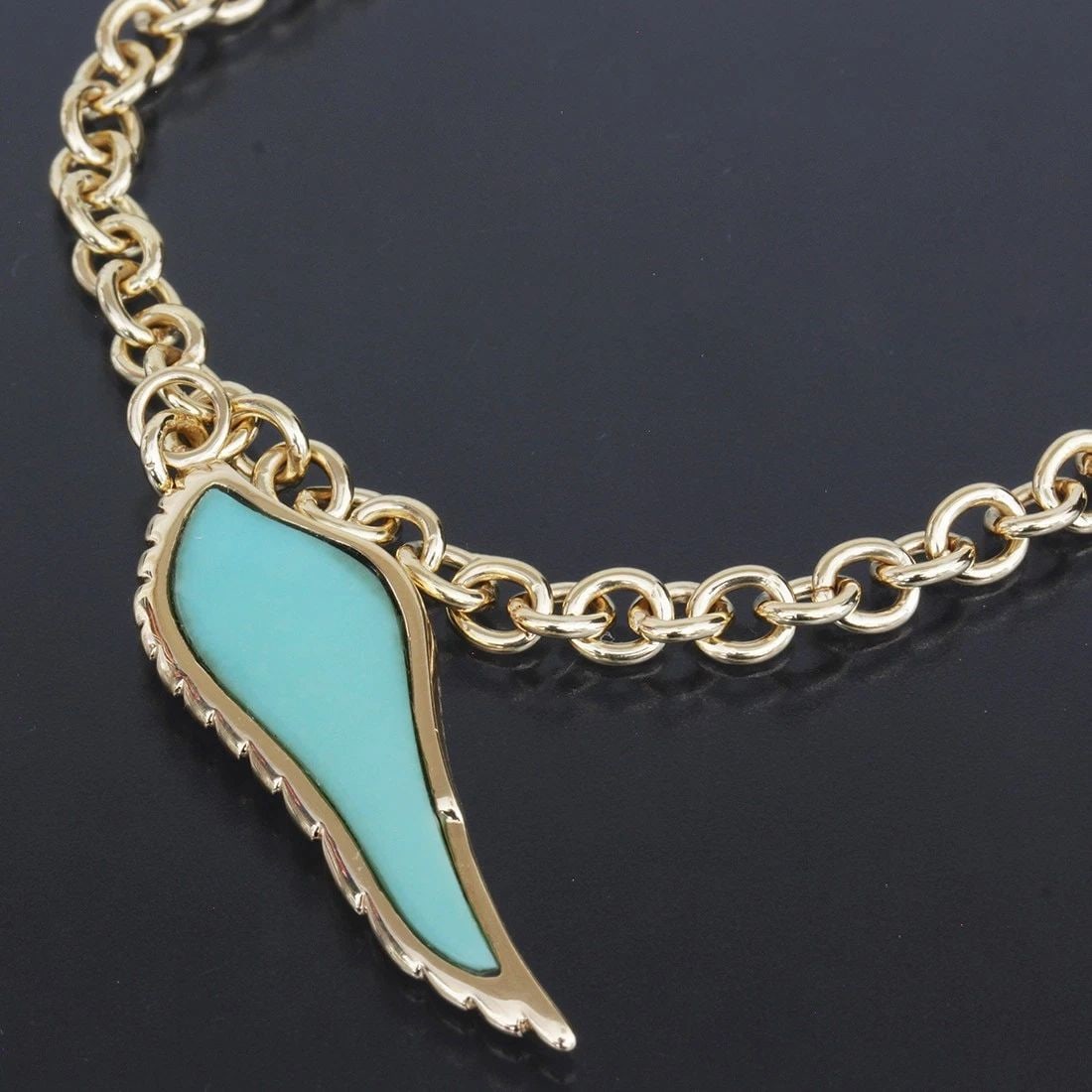 GARRARD TURQUOISE BRACELET K18YG 9G YELLOW GOLD E1873: GARRARD TURQUOISE BRACELET K18YG 9G YELLOW GOLD E1873 Style : Bracelet Length (Approx.) : 16cm Width (Approx.) : 2.1mm Charm Size (if any) (Approx.) : 3.2 x 0.9 cm Material : Yellow Gold 18K Main Ston