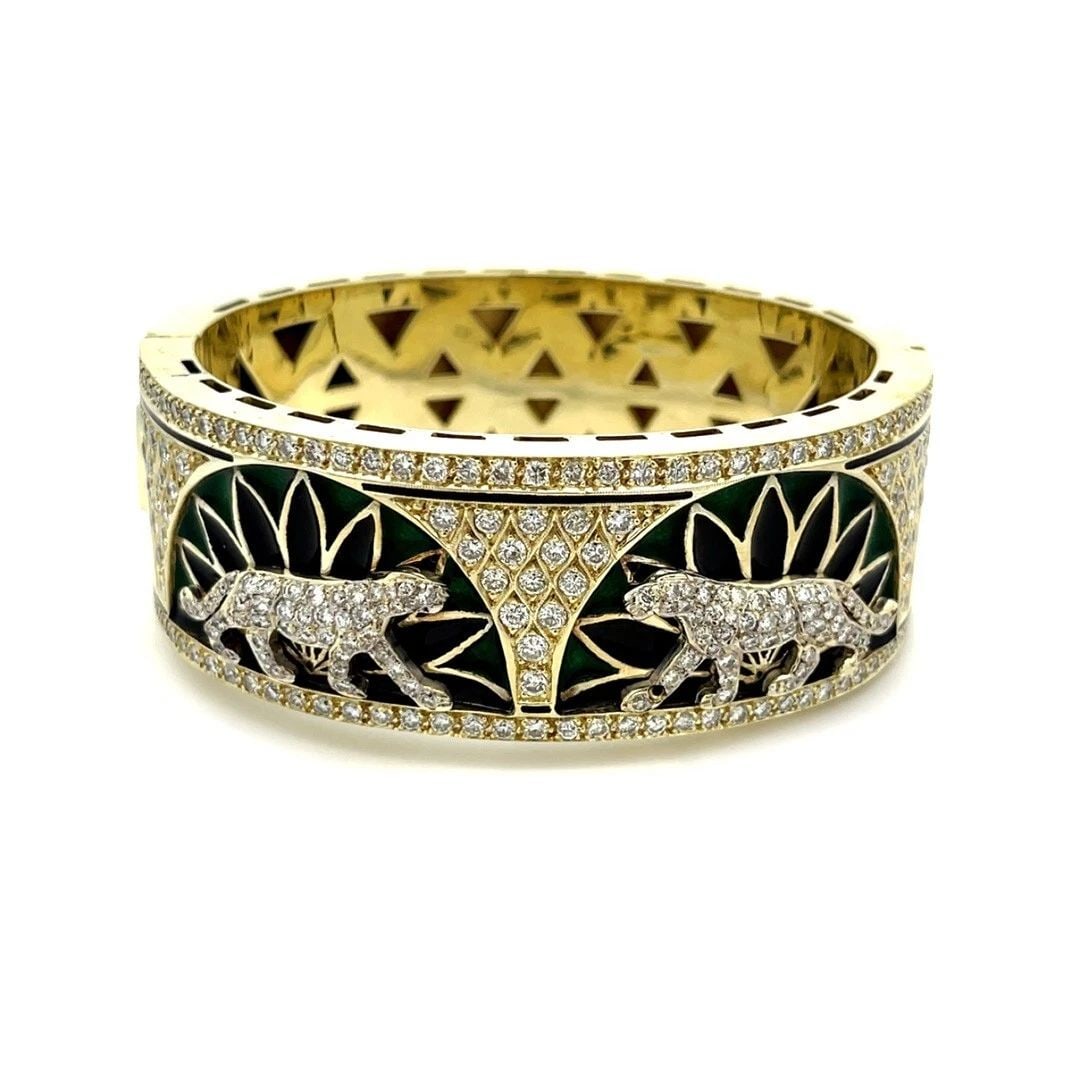 DIAMONDS 14K PANTHER BRACELET YELLOW GOLD ENAMEL WIDE BANGLE: DIAMONDS 14K PANTHER BRACELET YELLOW GOLD ENAMEL WIDE BANGLE This is a large, impressive bracelet, it is well crafted from 14k yellow and white gold with a polished finish. The front half has two half