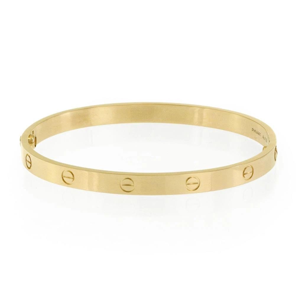 CARTIER LOVE 18K YELLOW GOLD 6MM WIDE BANGLE SIZE 21 W/SCREWDRIVER PAPER: CARTIER LOVE 18K YELLOW GOLD 6MM WIDE BANGLE SIZE 21 W/SCREWDRIVER PAPER Cartier Love 18k Yellow Gold 6mm Wide Bangle Size 21 w/Screwdriver Paper Description This is the iconic authentic bracelet by C