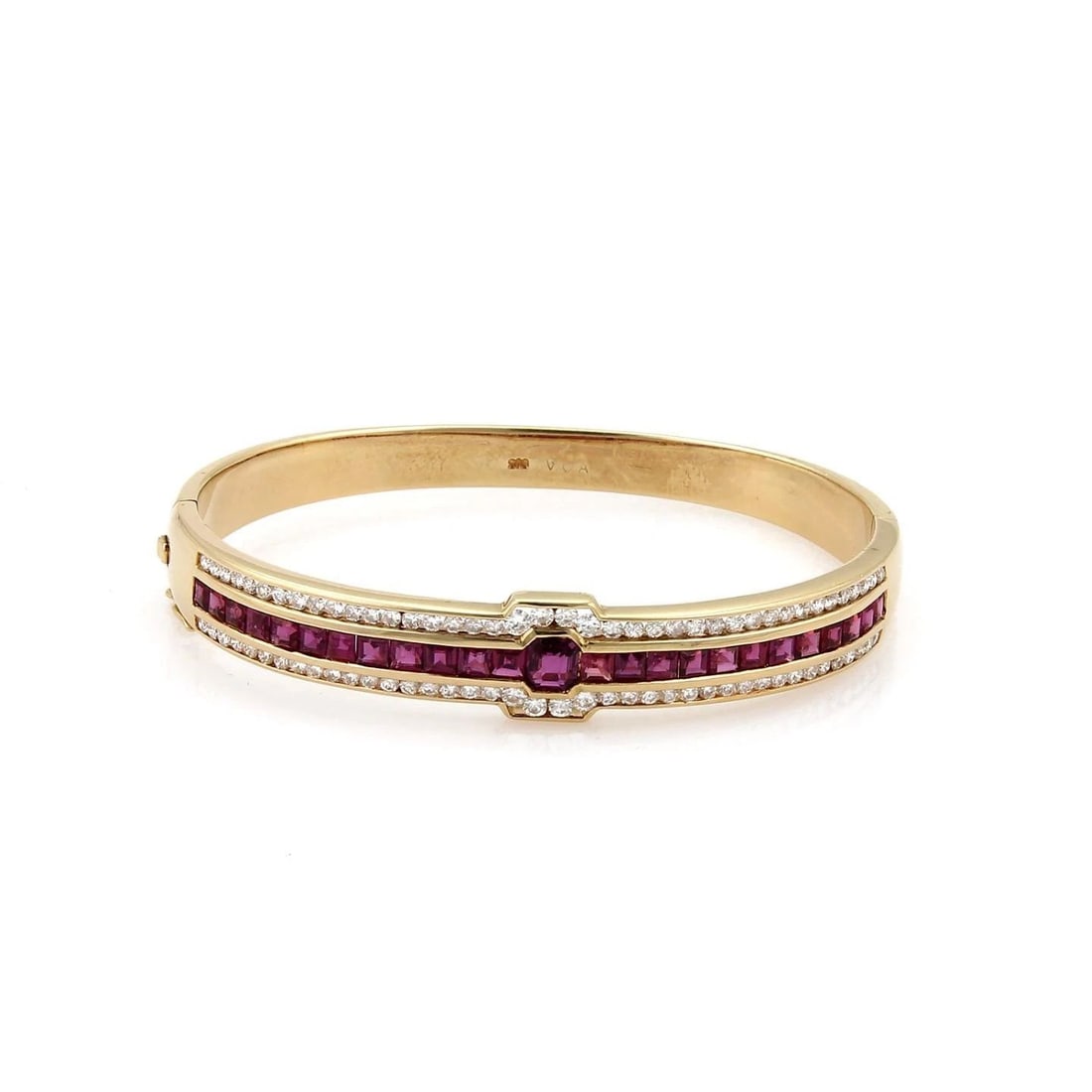 DIAMOND GOLD BANGLE GEMSTONE 14K YELLOW GOLD HINGED STYLE: DIAMOND GOLD BANGLE GEMSTONE 14K YELLOW GOLD HINGED STYLE The Diamond & Ruby Bangle in 14k Yellow Gold is a luxurious and elegant piece of fine jewelry. This channel-set bracelet features a square-sha