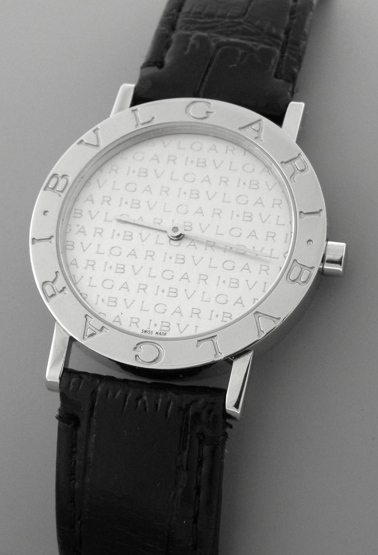 BVLGARI LOGO MANIA STAINLESS BB33SL QUARTZ WATCH: BVLGARI STAINLESS STEEL LOGO MANIA WATCHWatch will fit a wrist size upto 8.75" Face measures 33mm wide without crownPre-owned, in good condition, minor wear to band, band not original, please refer to